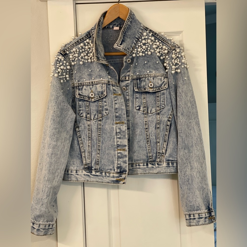 Women’s medium embellished jean jacket.